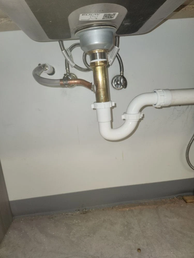 Sink drain and P-trap installation