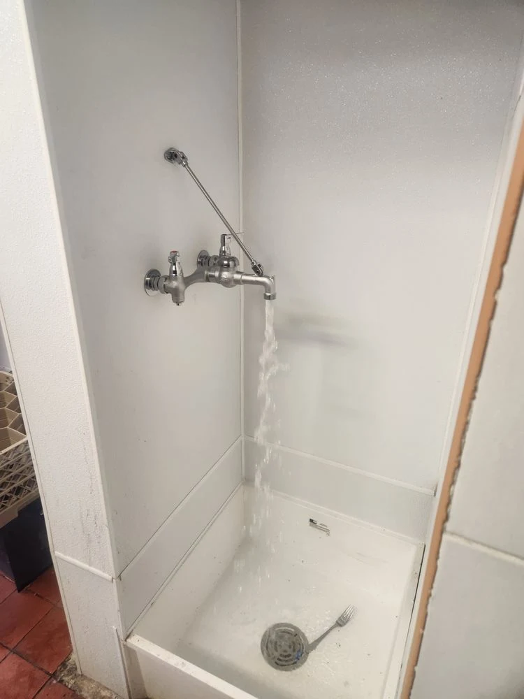Utility sink faucet installation