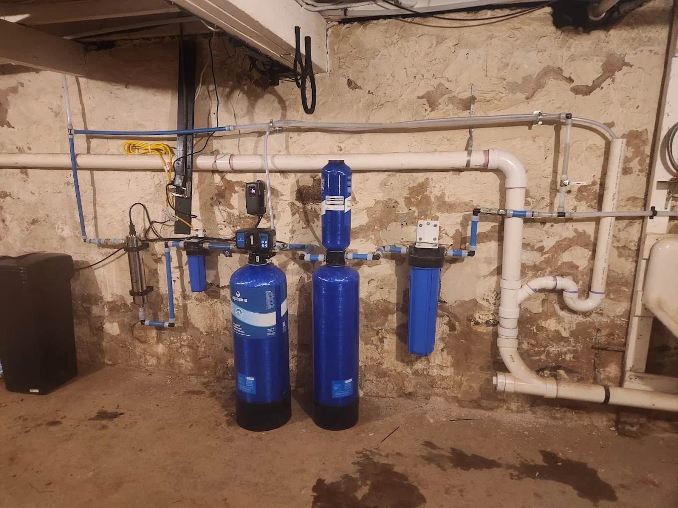 Whole-house water filtration and softener system installation