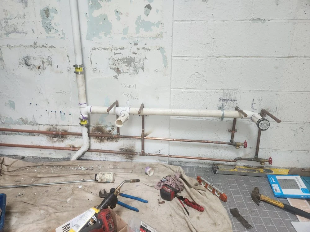 Backflow preventer and pressure regulator installation