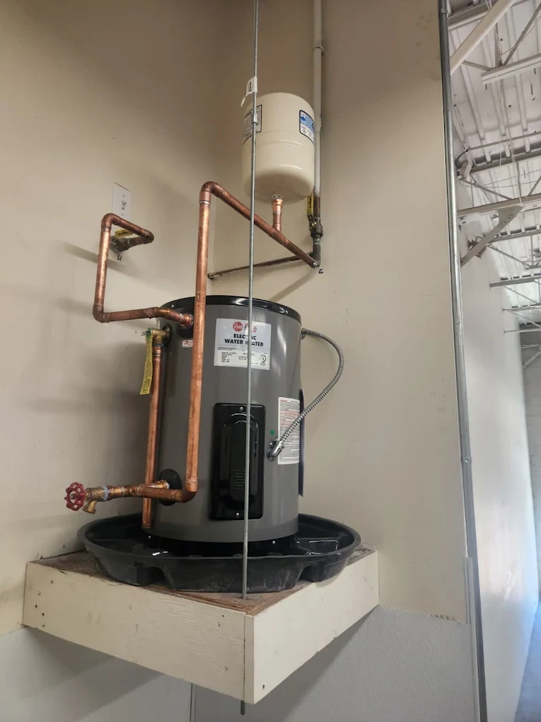 New electric water heater installation with expansion tank